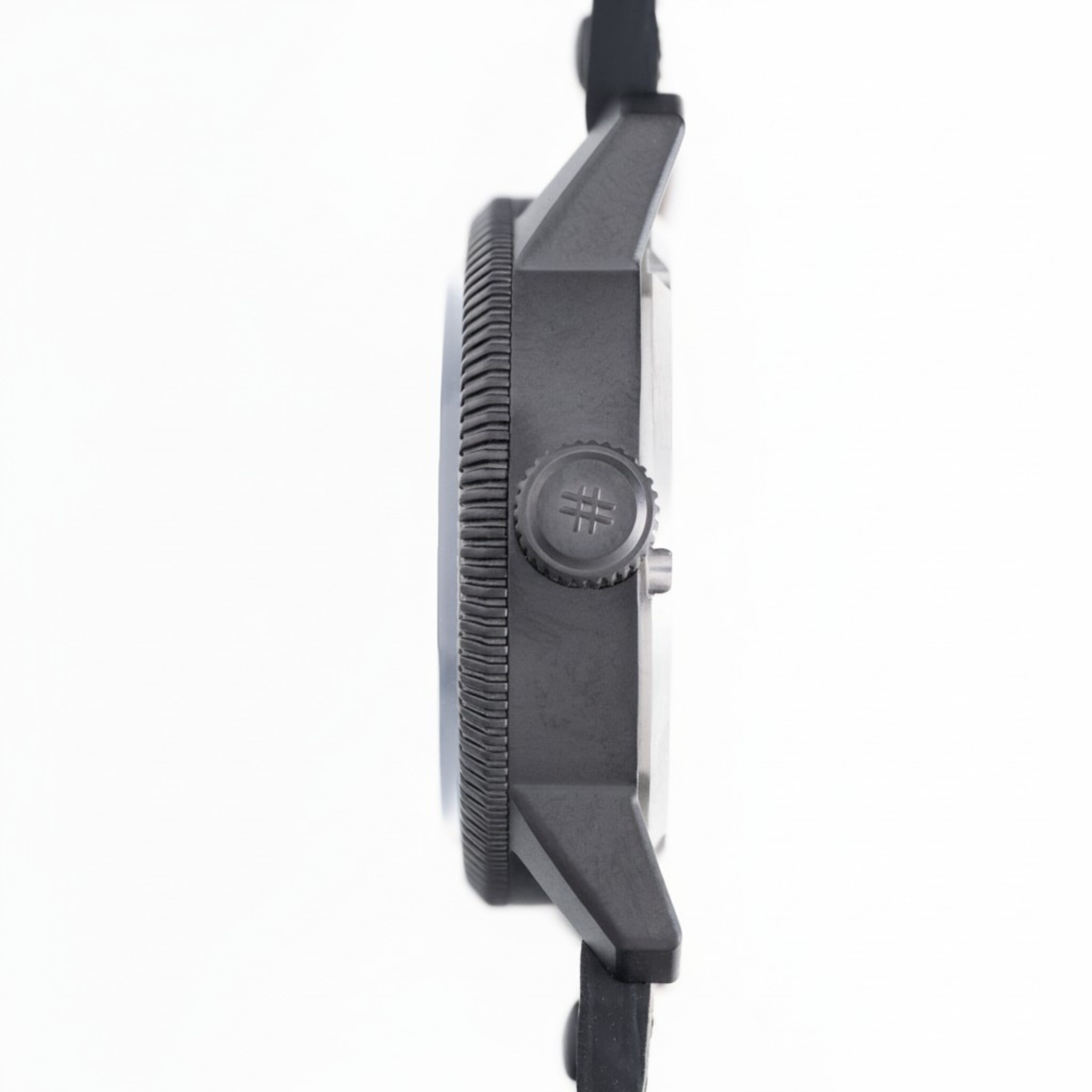 Close-up side profile of  Guaraguao GMT  Pvd case black watch with a textured bezel and crown, shown against a plain white background.